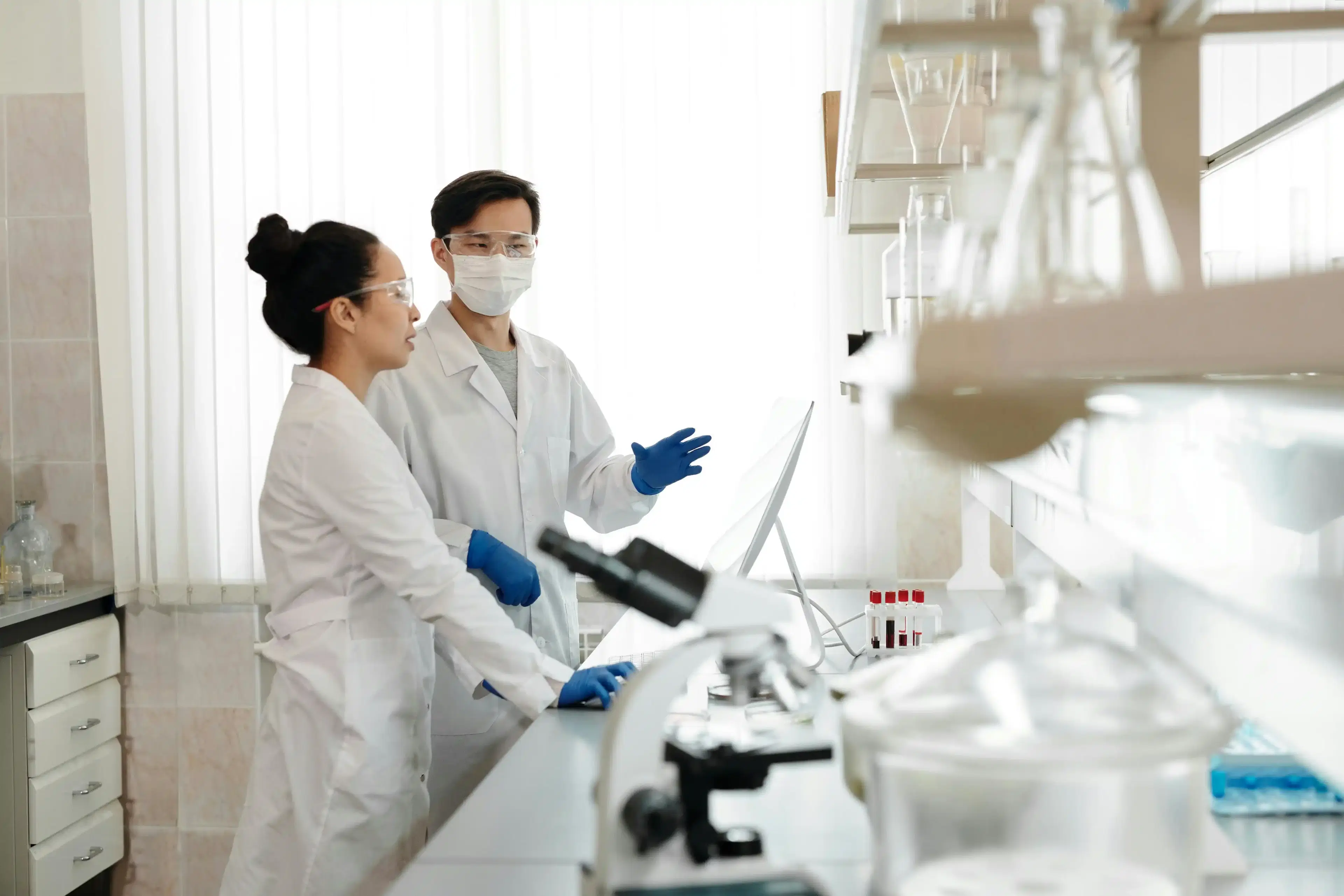 Researcher handling sample tubes